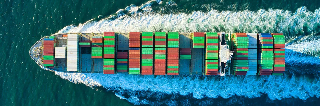 A top-down photo a container ship